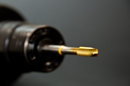 Tapping in Automotive Parts Manufacturing: The "Industrial Tooth"